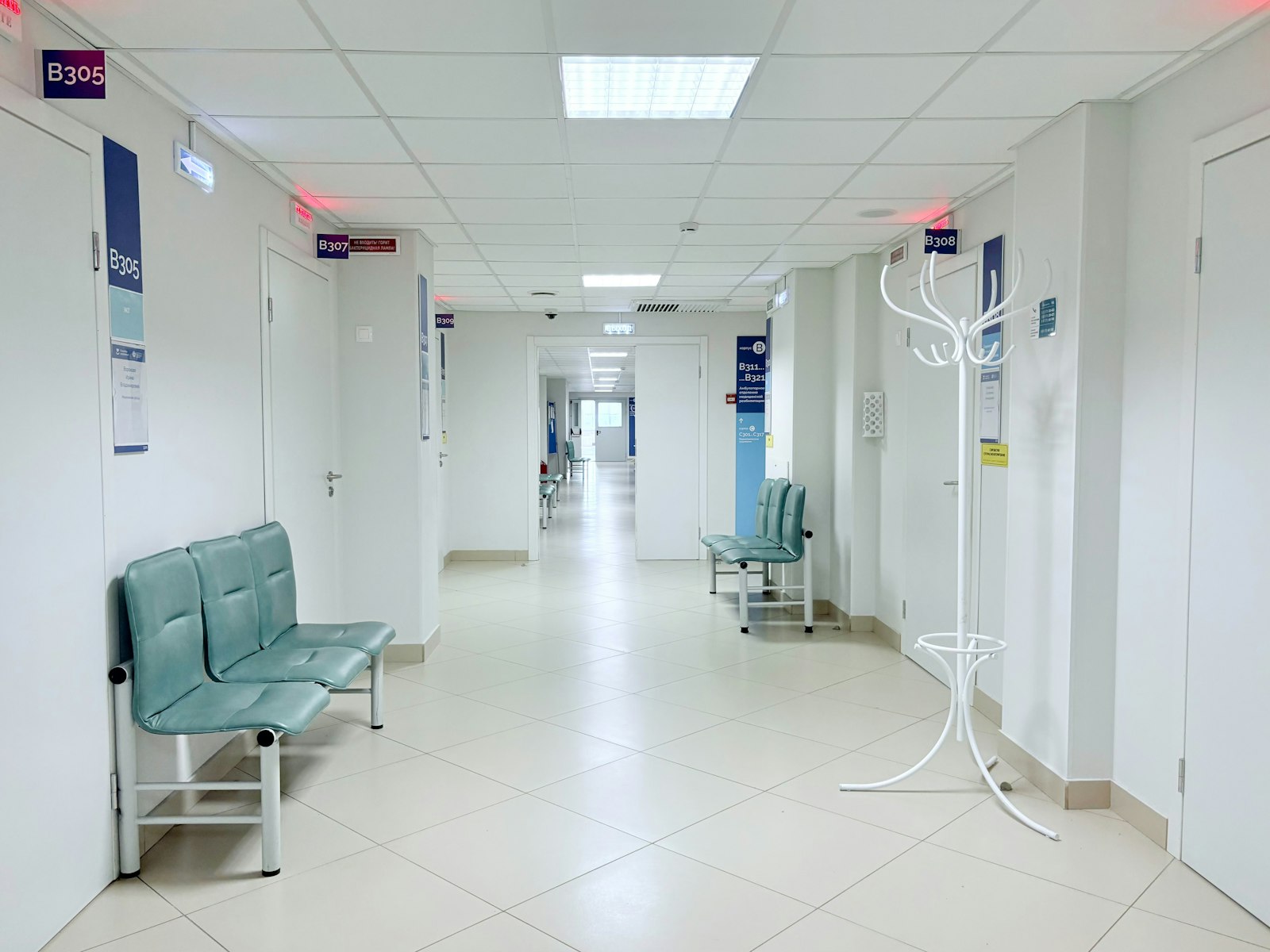 Bright, empty hospital corridor
