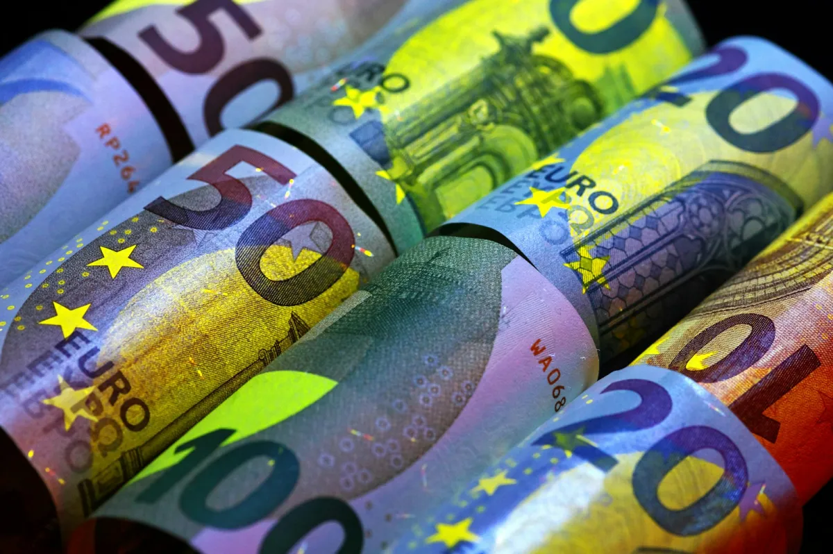 Rolled euro banknotes in different denominations Rolled euro banknotes in different denominations