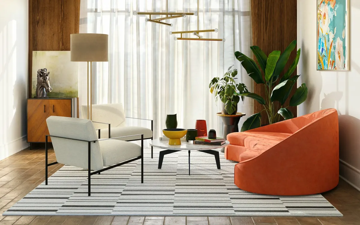 A bright living room with sheer white curtains, an orange sofa and two armchairs A bright living room with sheer white curtains, an orange sofa and two armchairs