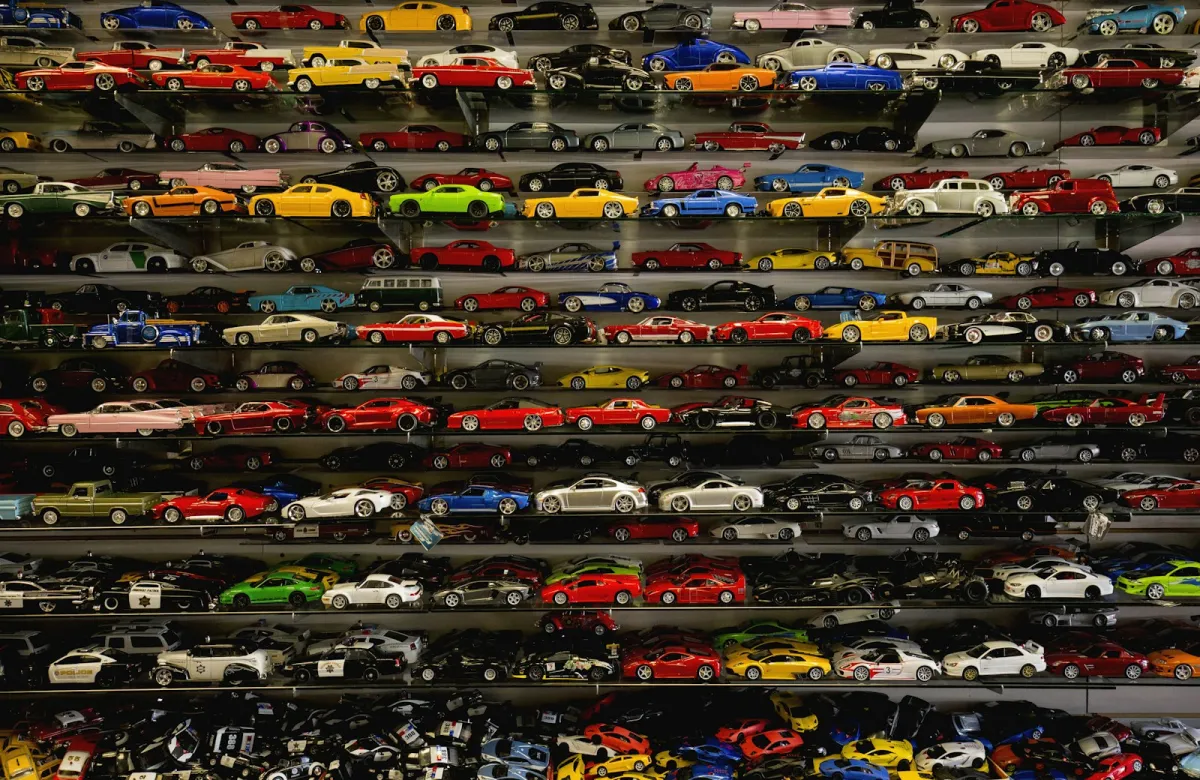 Shelves packed with rows of colourful die-cast model cars