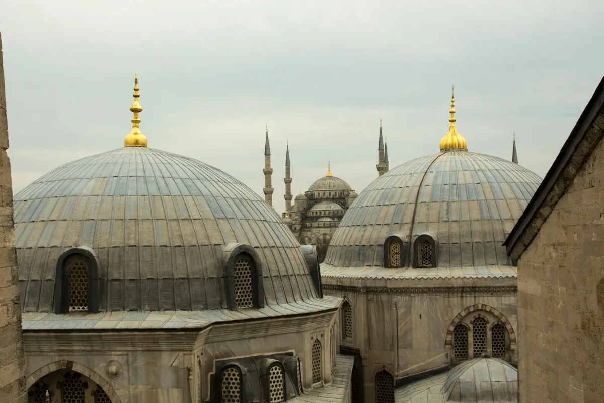 The domes of Hagia Sophia with the Blue Mosque and its minarets behind, Istanbul The domes of Hagia Sophia with the Blue Mosque and its minarets behind, Istanbul