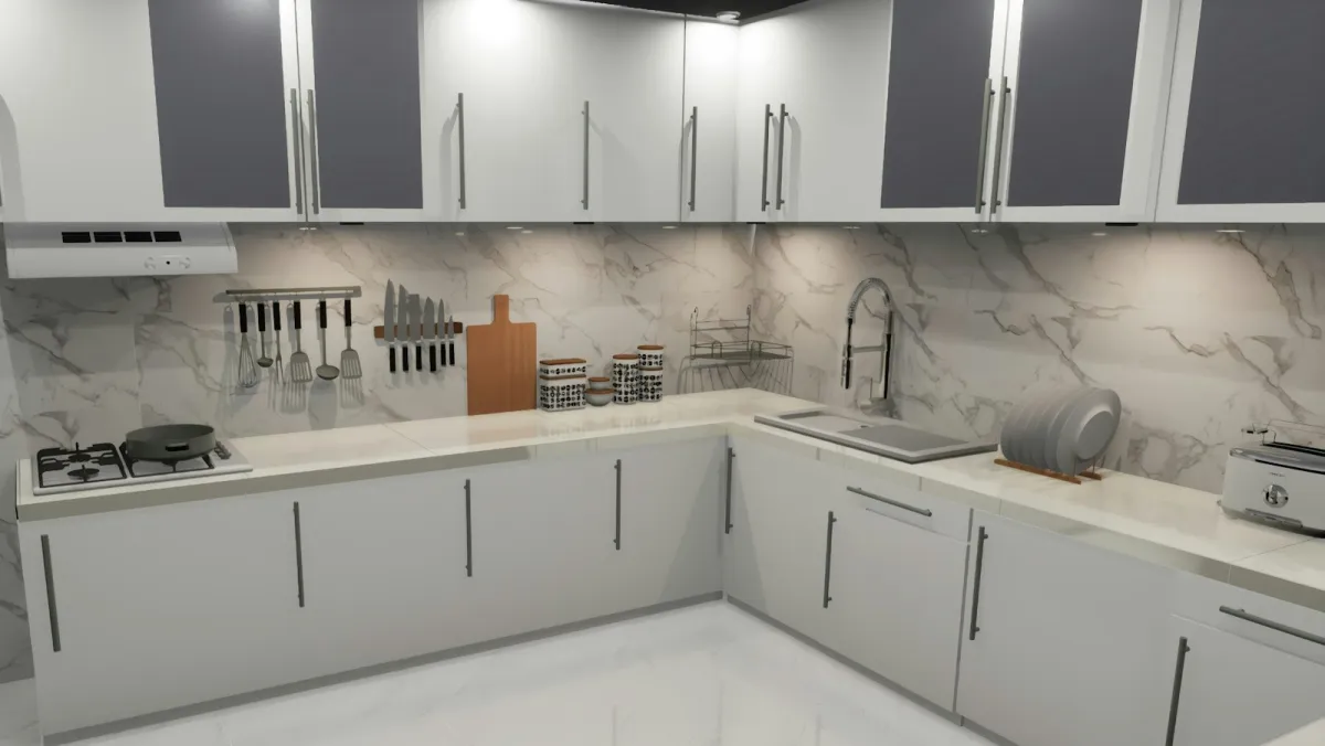 A white fitted kitchen with marble-effect splashback, hob, sink and utensils on the worktop