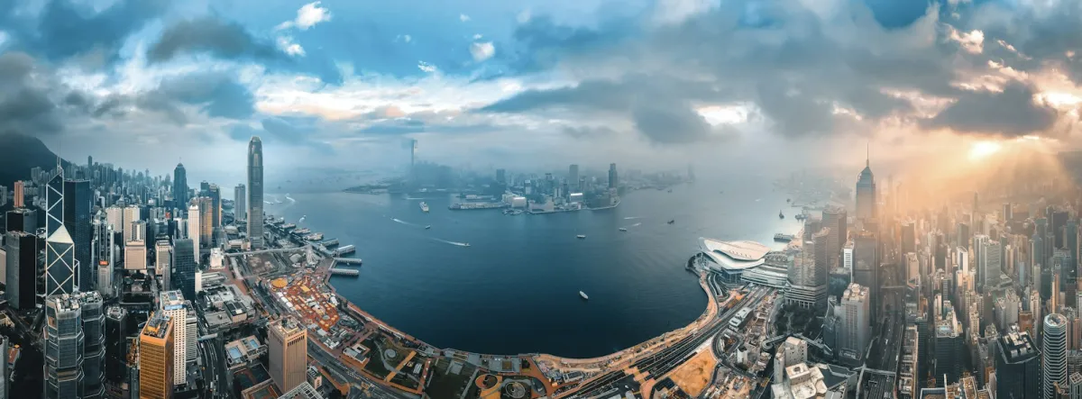 Panoramic aerial view of the Hong Kong skyline around Victoria Harbour Panoramic aerial view of the Hong Kong skyline around Victoria Harbour