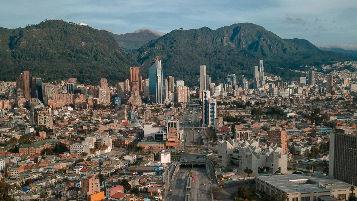 Bogotá's skyline in front of the green Eastern Hills Bogotá's skyline in front of the green Eastern Hills