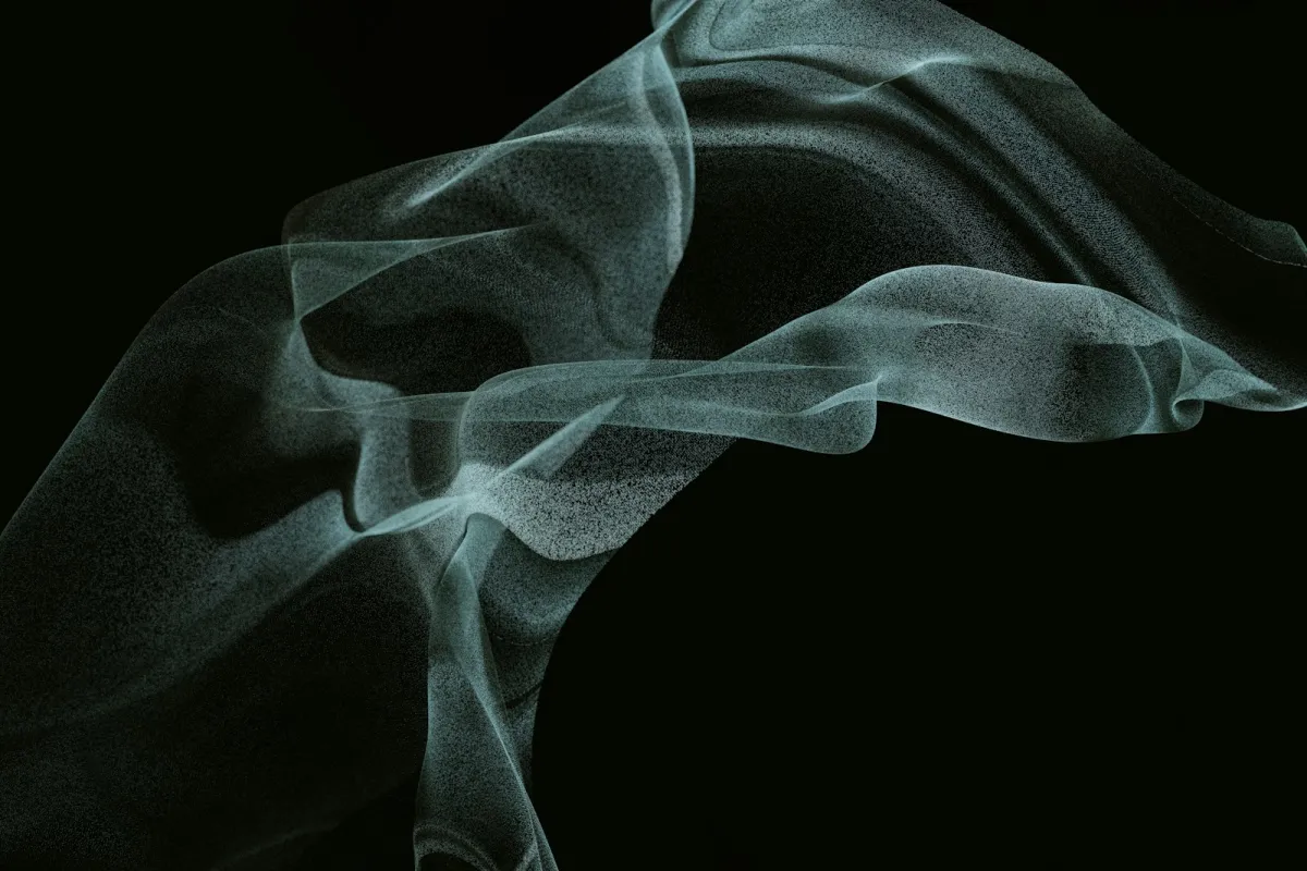 Soft wisps of pale smoke against a black background Soft wisps of pale smoke against a black background