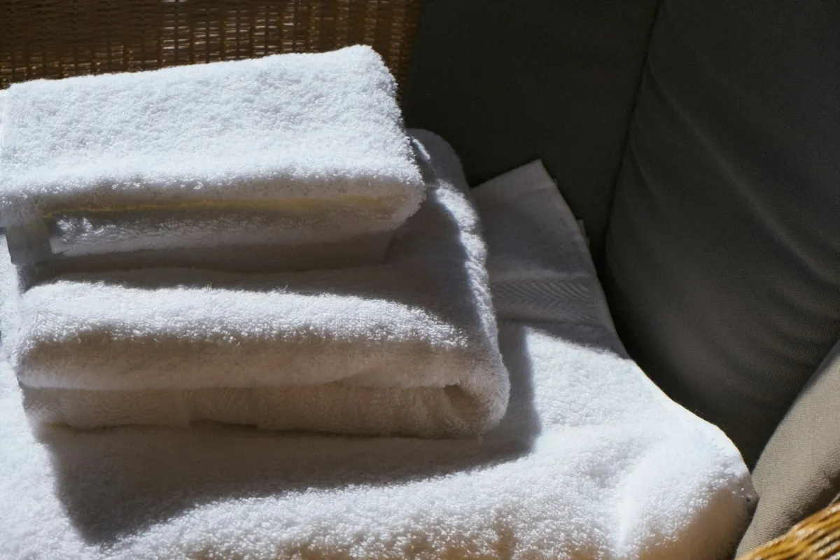 A stack of clean white towels A stack of clean white towels