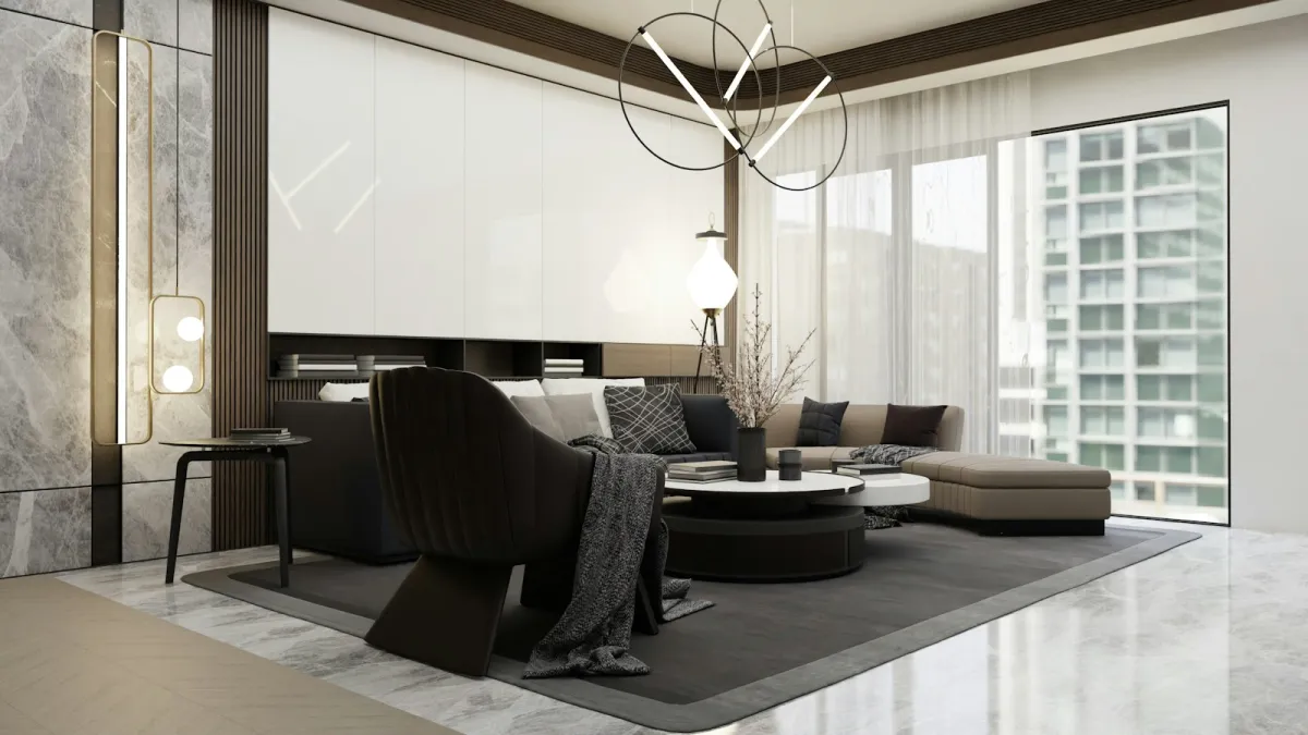 Modern living room with a sofa, armchair, round coffee table and pendant lights Modern living room with a sofa, armchair, round coffee table and pendant lights