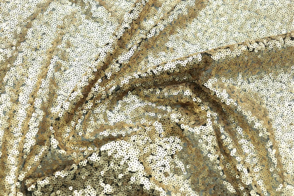 Close-up of draped gold sequin fabric