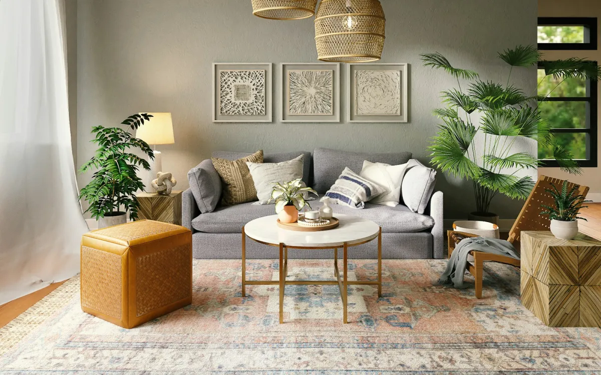 A grey sofa with patterned cushions in a living room with woven pendant lights