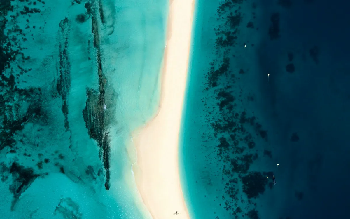 Aerial view of a white sandbar surrounded by turquoise water off Zanzibar Aerial view of a white sandbar surrounded by turquoise water off Zanzibar
