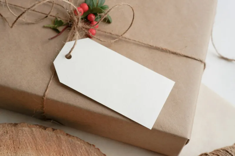 AliExpress: a giant marketplace with pound-shop prices and free Choice shipping A parcel wrapped in brown paper and twine with a blank white tag