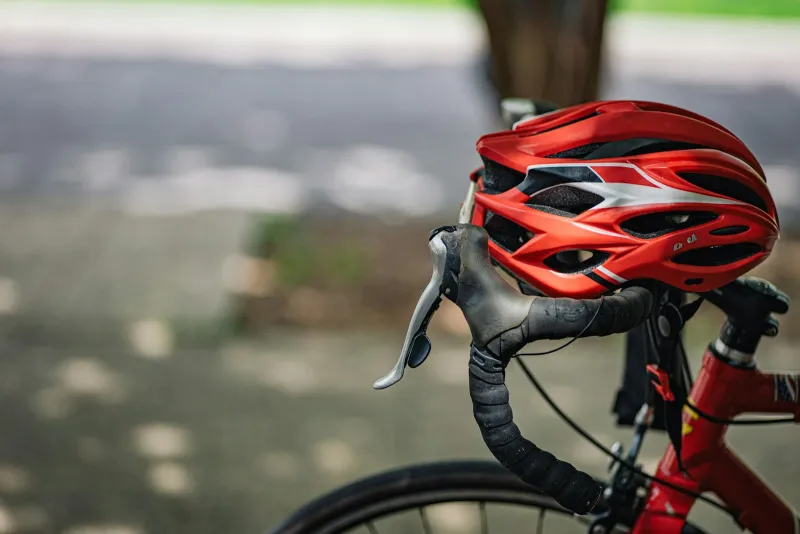Bern: what UK riders need to know now Bern Europe has closed A red cycling helmet resting on the handlebars of a road bike