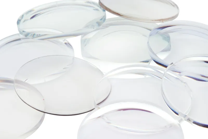 Contact Lens King: brand-name contact lenses from the US, explained A pile of clear round lenses on a white surface