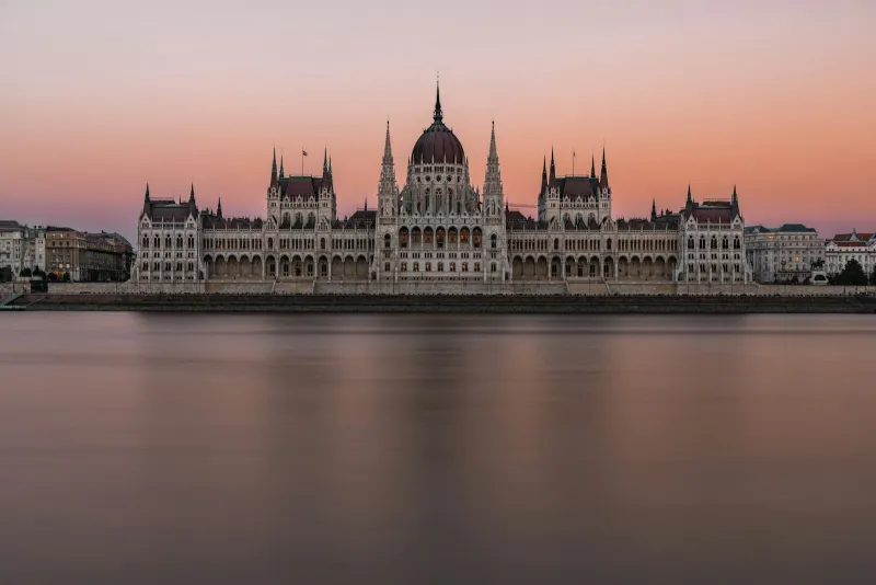The Hungarian Parliament Building across the Danube in Budapest at dusk