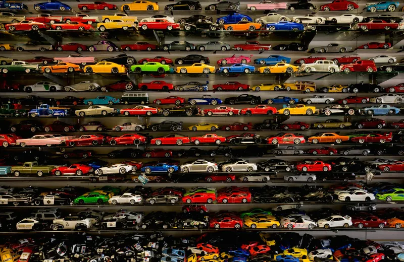 Shelves packed with rows of colourful die-cast model cars
