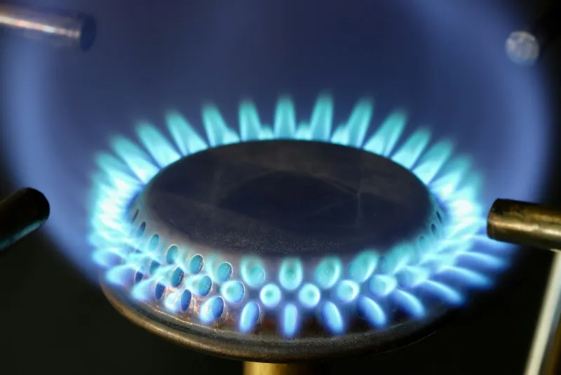 Blue flames on a gas hob burner