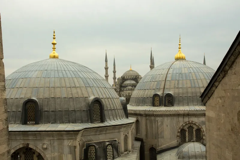 The domes of Hagia Sophia with the Blue Mosque and its minarets behind, Istanbul