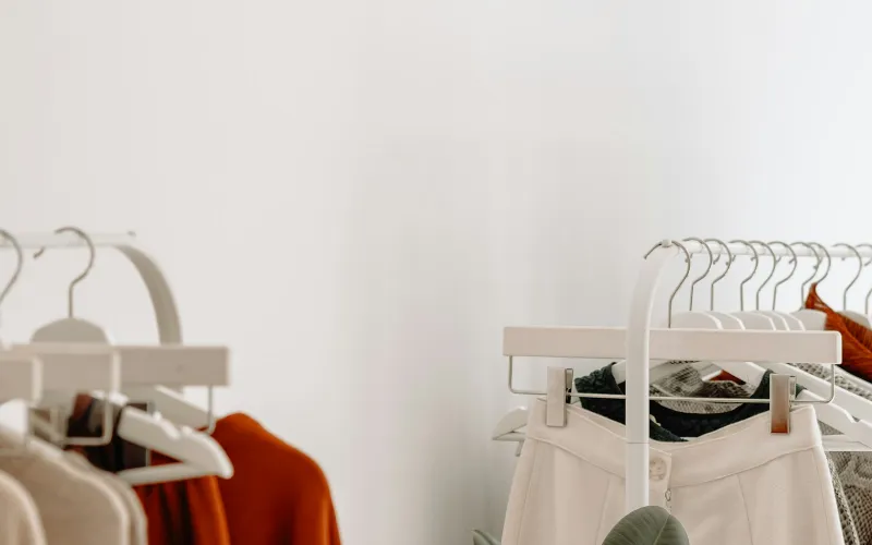 METRO BRAZIL: Brazilian-made shapewear from a Gulf specialist White clothes rails with neutral-toned garments against a white wall