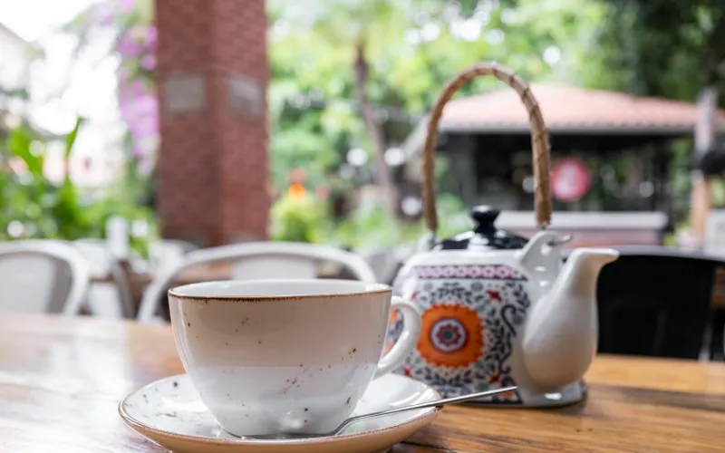 PrimeCarers: choose a vetted private carer and see the rate upfront A cup of tea and a patterned teapot on a wooden table