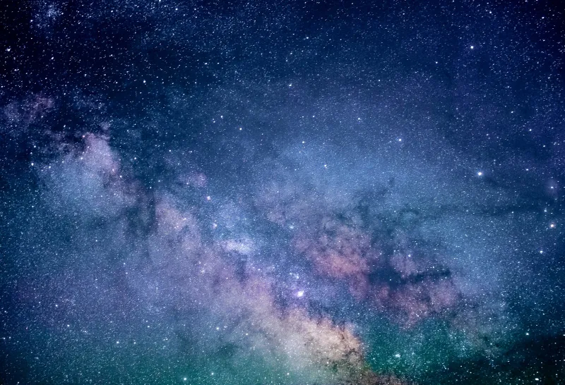 Blue and purple starry galaxy in the night sky