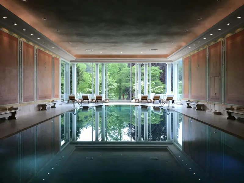Thermana Laško: thermal spa breaks in Slovenia's Savinja valley Indoor spa swimming pool with tall windows looking out onto green trees