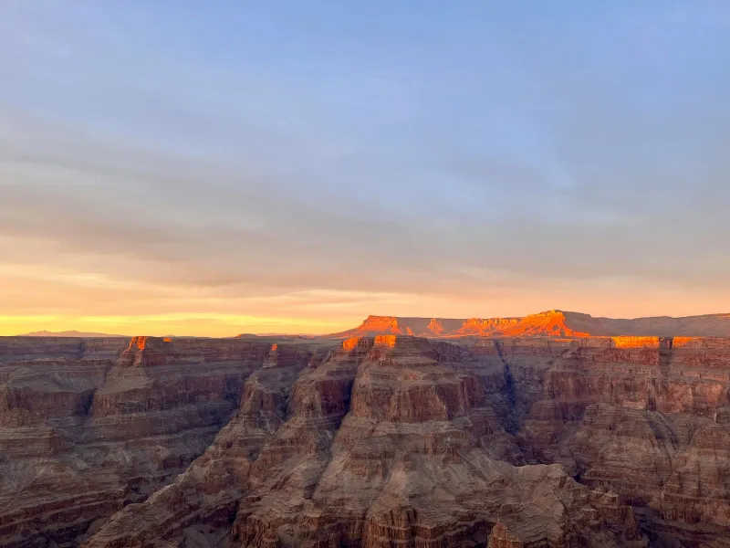Sunset light on the layered cliffs of the Grand Canyon
